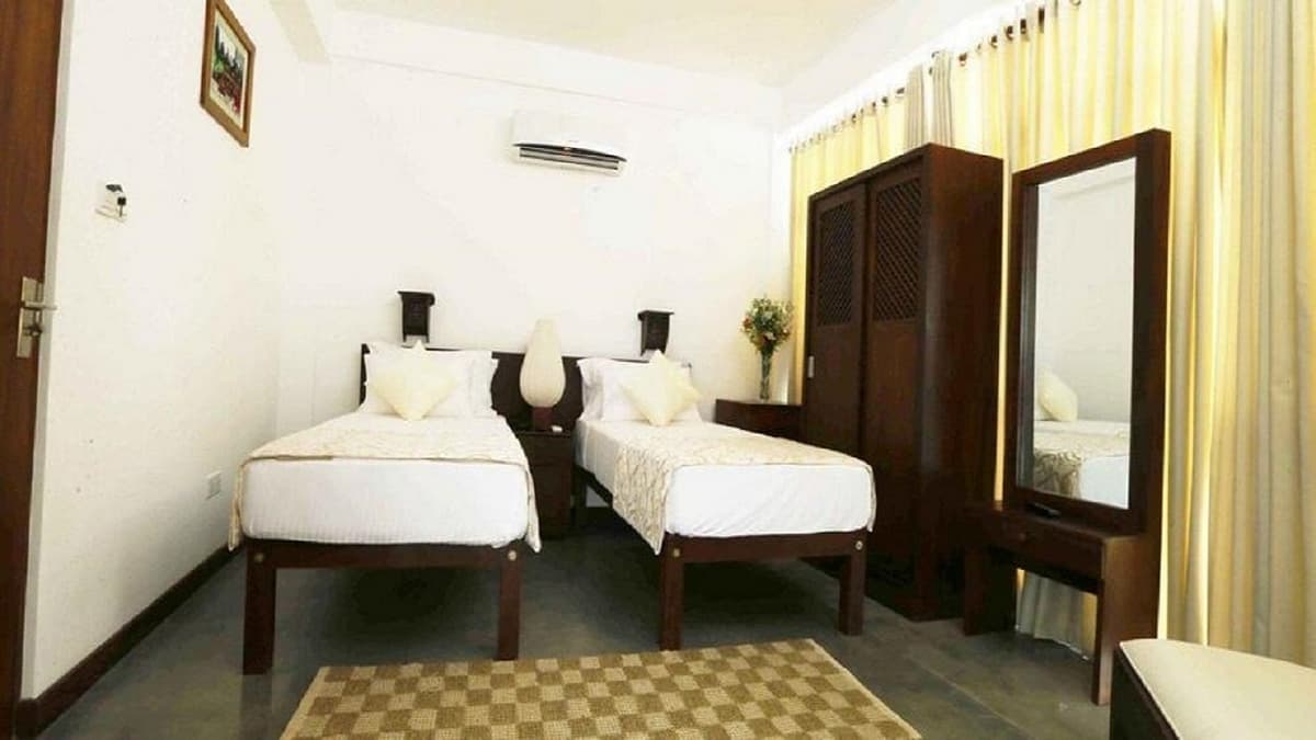 Deluxe Twin Bed Room with AC at Rock Fort Beach Resort Unawatuna