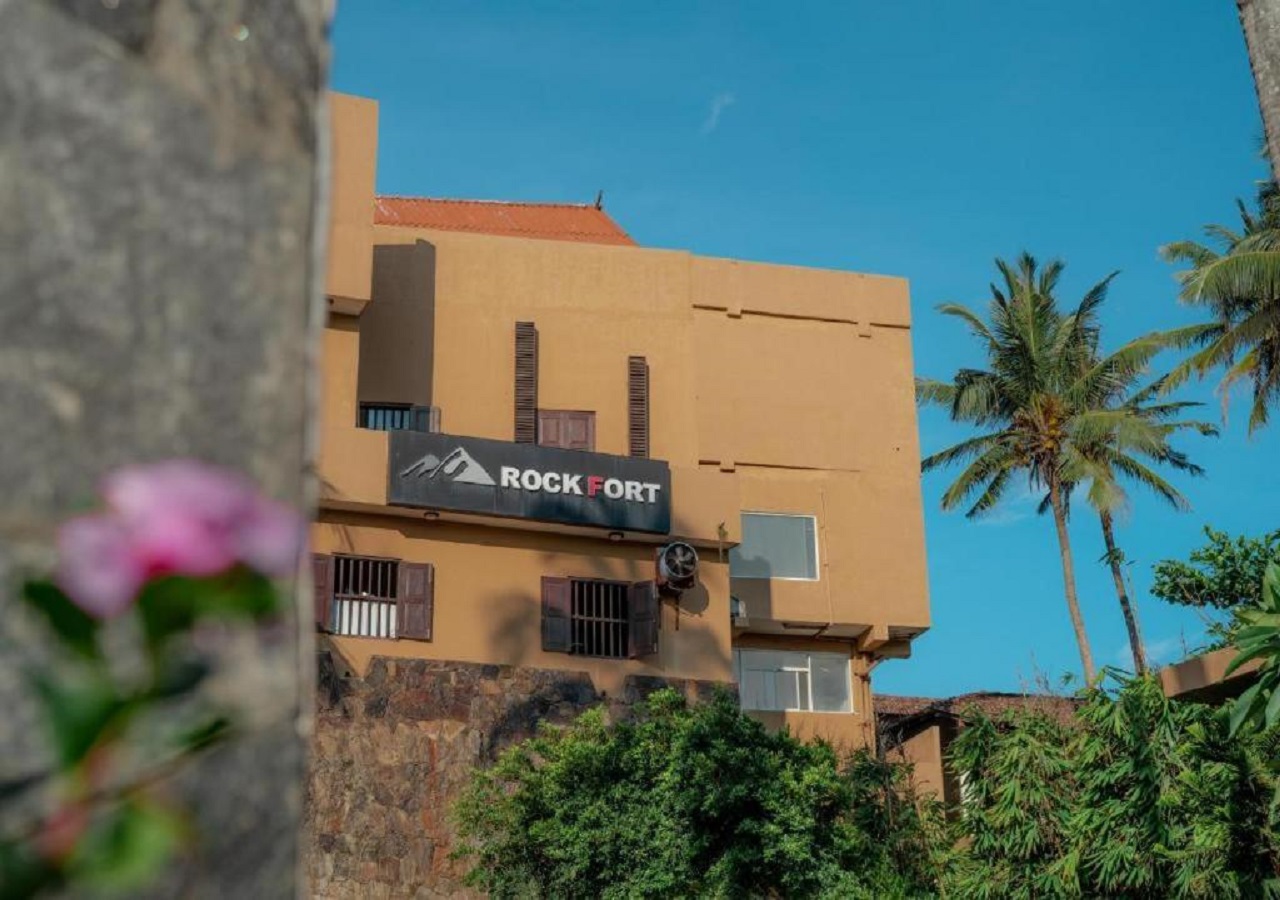Resort Exterior Amidst Coastal Coconut Palms